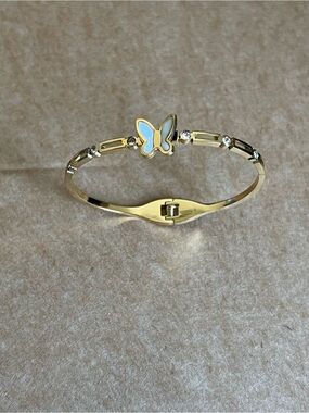 18kt gold steel plated Gold Butterfly Bangle Bracelet with White Enamel Accent